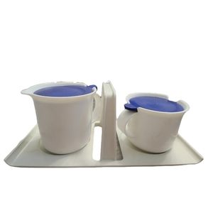 Vintage Tupperware cream and‎ sugar set